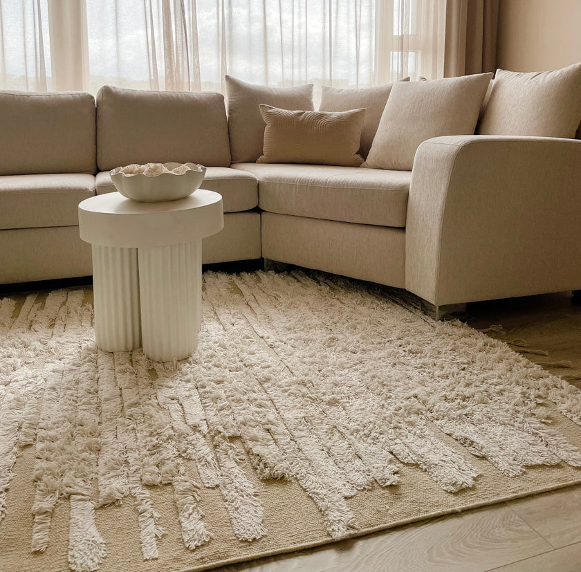 Beige motta með kögri