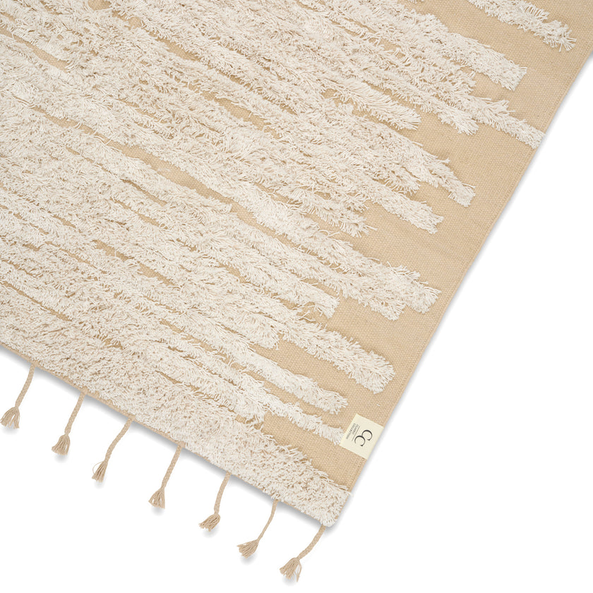 Beige motta með kögri