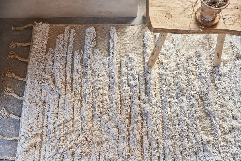 Beige motta með kögri